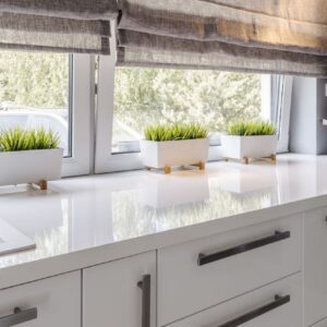Closeup,Shot,Of,A,White,Countertop,In,A,Modern,Kitchen