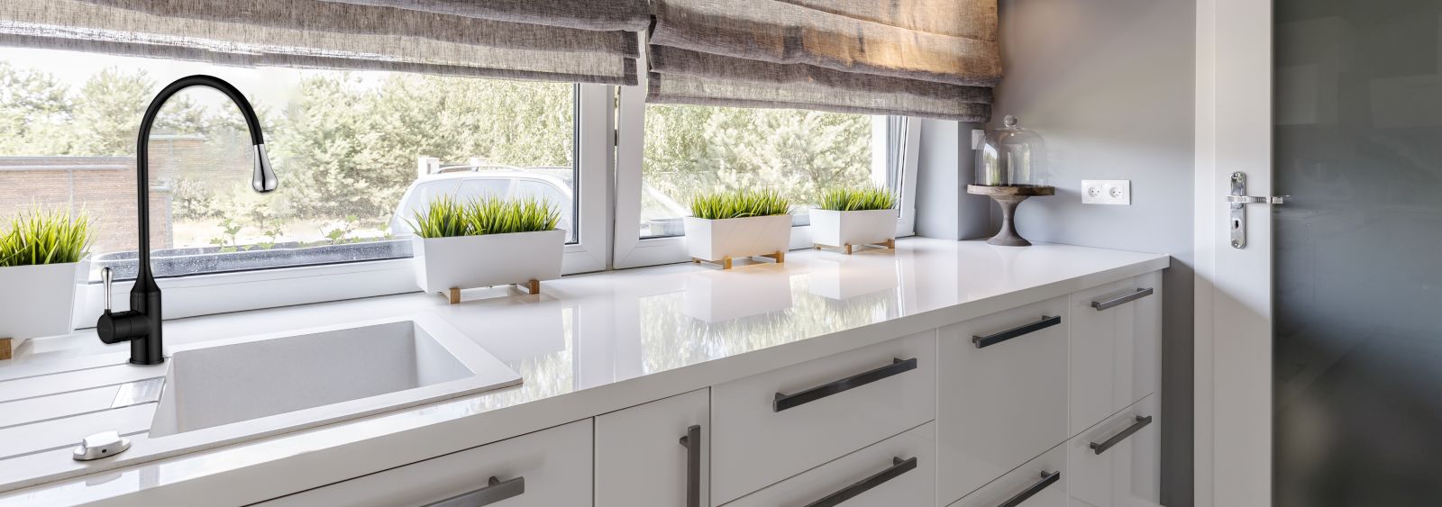Closeup,Shot,Of,A,White,Countertop,In,A,Modern,Kitchen